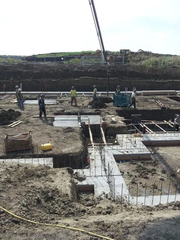 Commercial foundation footings with crew and crane