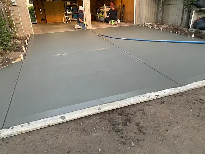 Residential driveway fresh pour with smooth finish