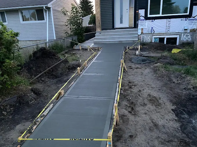 Residential front walkway and steps fresh pour