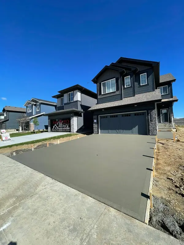 Upscale residential driveway with smooth finish